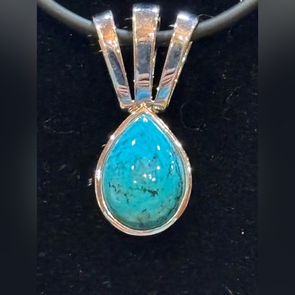 Turquoise Teardrop Pendant 925 Sterling Silver. On a 16 inch cord with 925 clasp